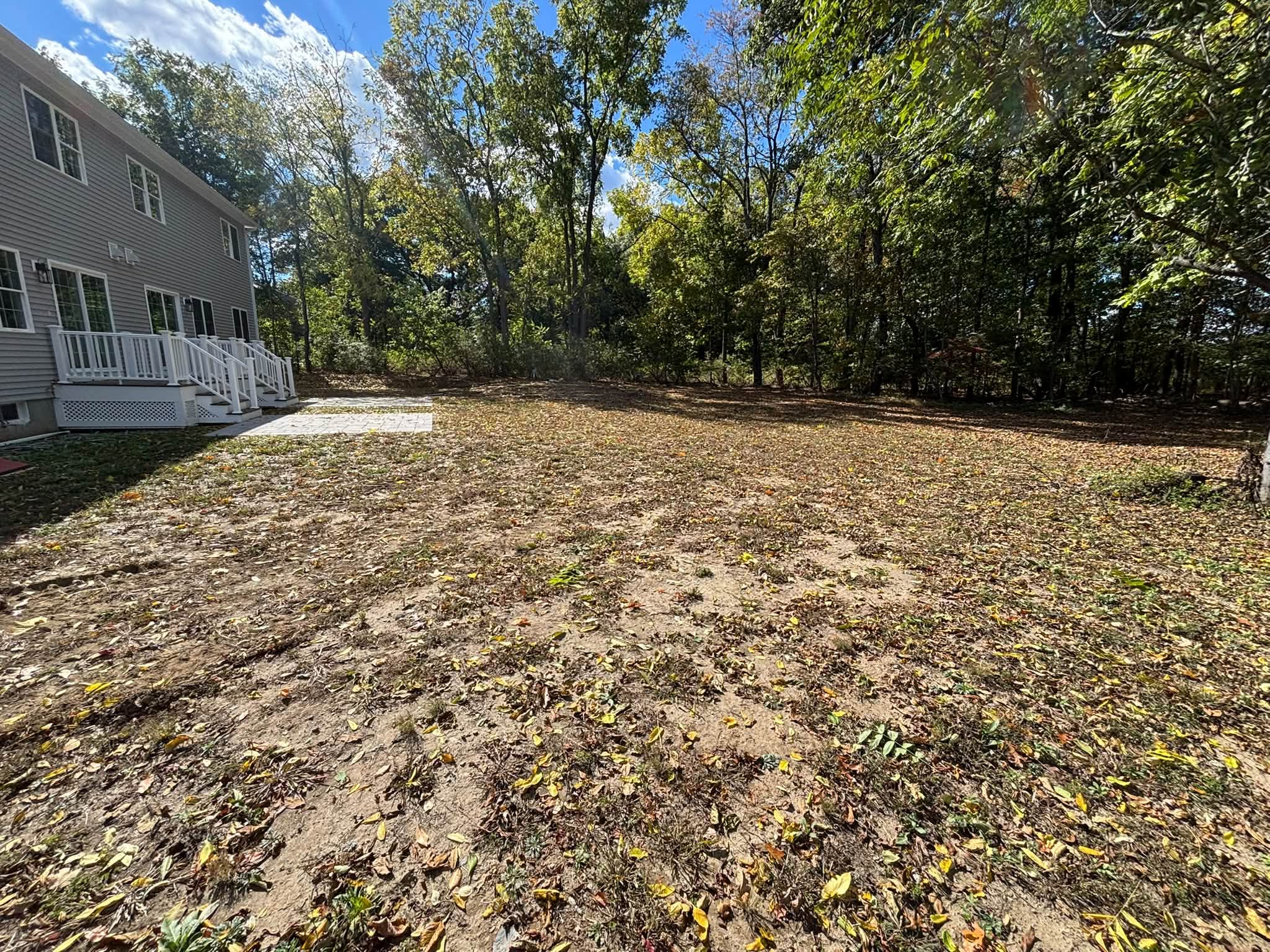 Further yard view before regrading — Auburn, MA